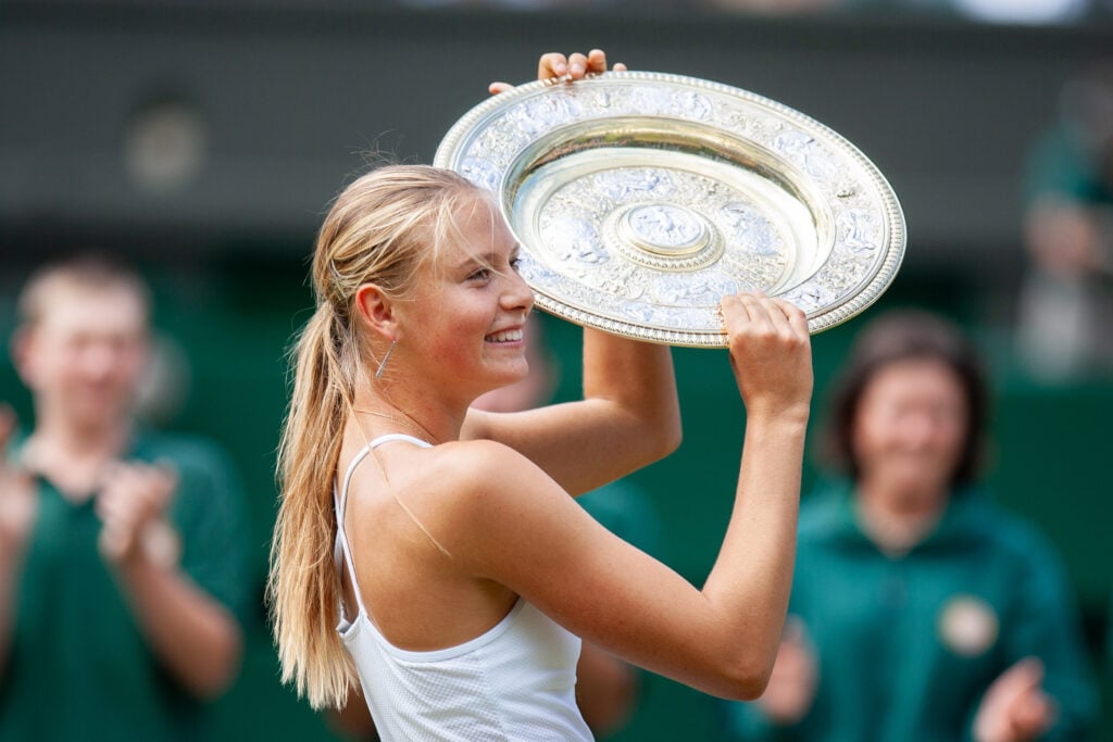Maria Sharapova celebrates after winning Wimbledon in 2004