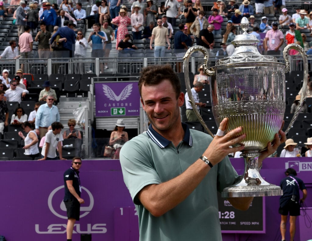 Tommy Paul celebrates after winning Queen's in 2024.