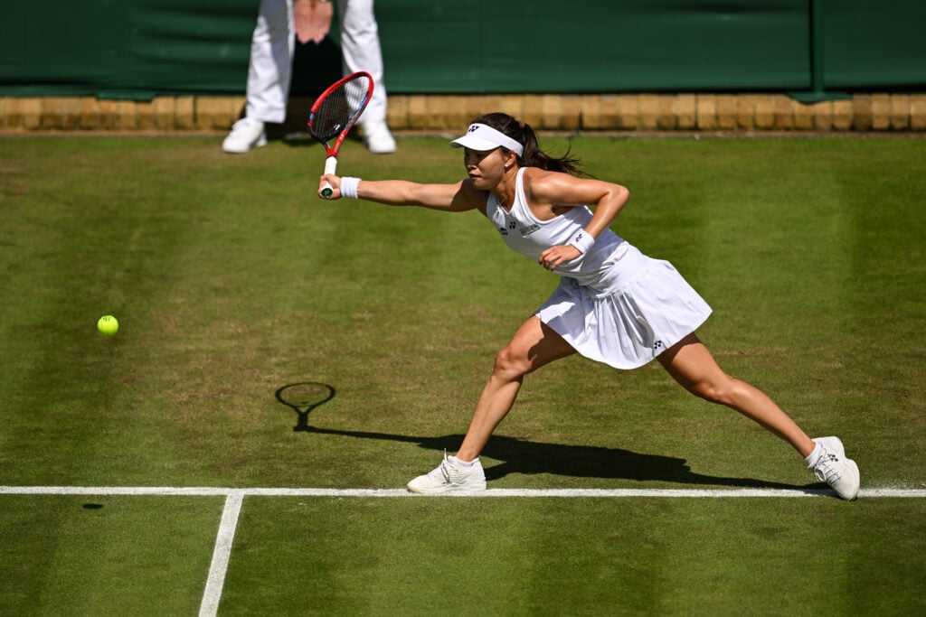 Yuriko Lily Miyazaki of Great Britain in action against Daria Kasatkina of Russia in the Ladies' Singles second round match during day four of The Championships Wimbledon 2024 at All England Lawn Tennis and Croquet Club on July 04, 2024 in London, England.