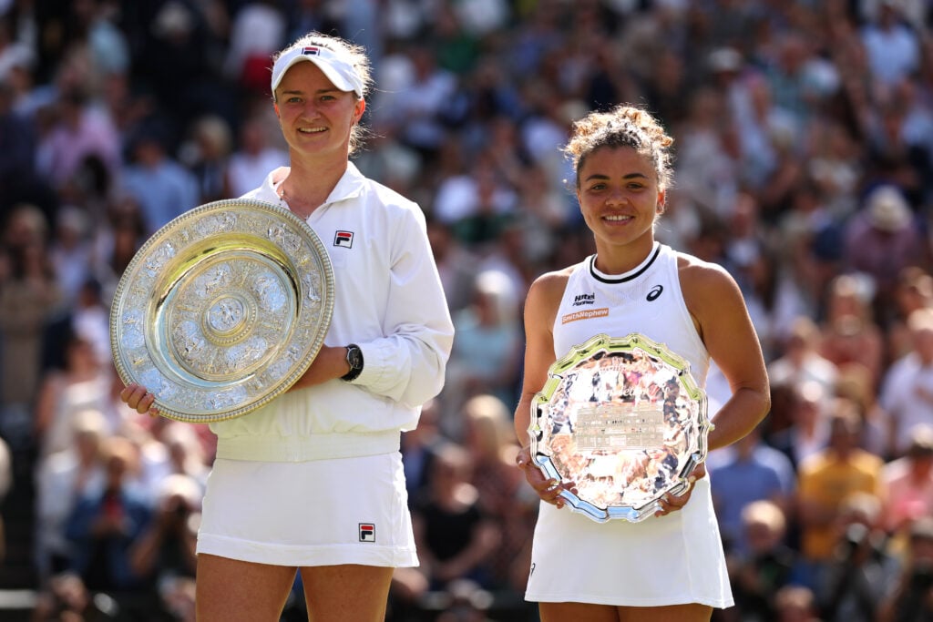 Barbora Krejcikova of Czechia poses with the Ladies' Singles Trophy alongside Jasmine Paolini of Italy with her Ladies' Singles Runner-Up Trophy following the Ladies' Singles Final match during day thirteen of The Championships Wimbledon 2024 at All England Lawn Tennis and Croquet Club on July 13, 2024 in London, England.