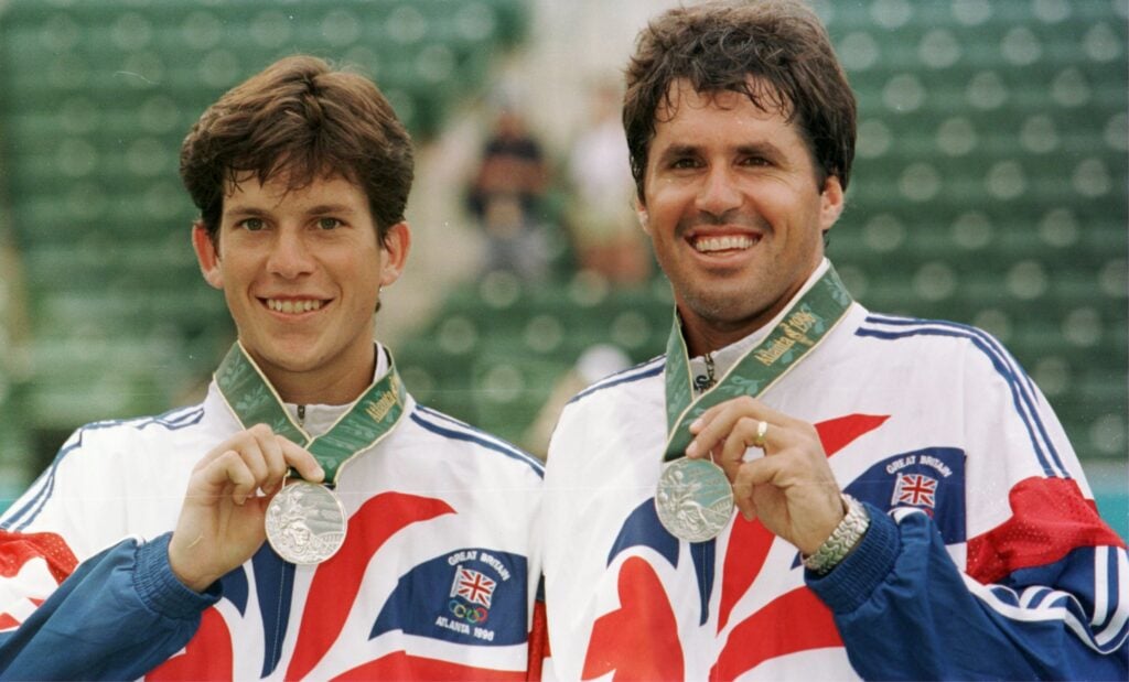 Tim Henman and Neil Broad of Great Britain, with their silver medals after the men's tennis doubles at Stone Mountain Tennis Center at the 1996 Centennial Olympic Games in Atlanta, Georgia. Woodforde and Woodbridge defeated Henman and Broad
