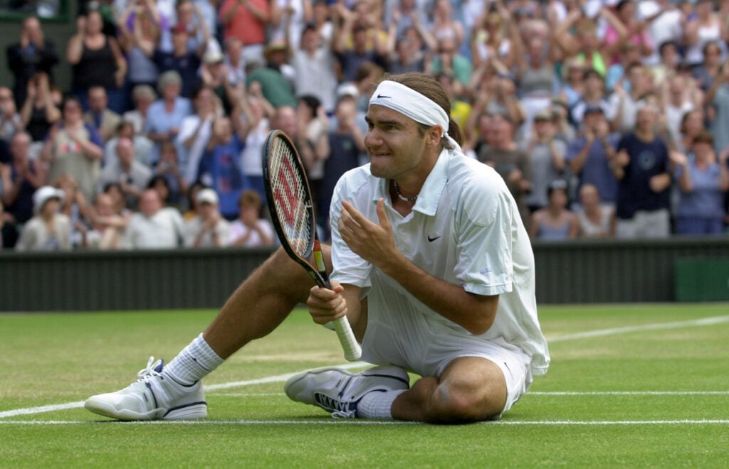 Roger Federer celebrates beating Pete Sampras at Wimbledon in 2001.