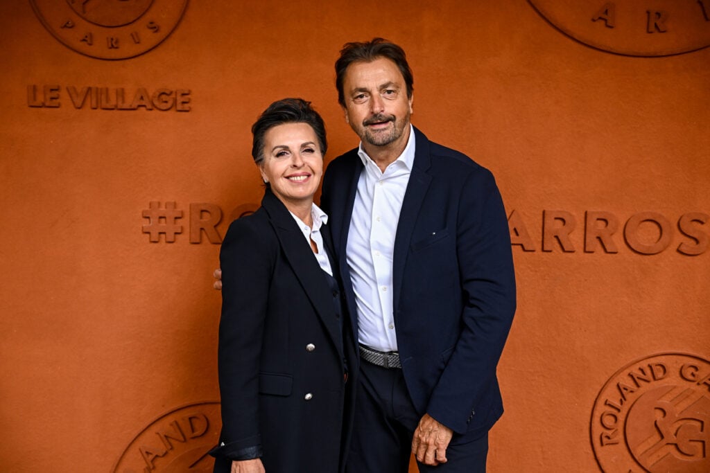 Maria Dowlatshahi and Henri Leconte attend the 2025 French Open at Roland Garros on May 27, 2025 in Paris, France.