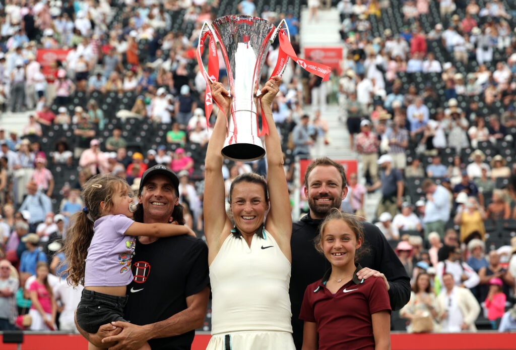 Tatjana Maria celebrates after winning Queen's in 2025.