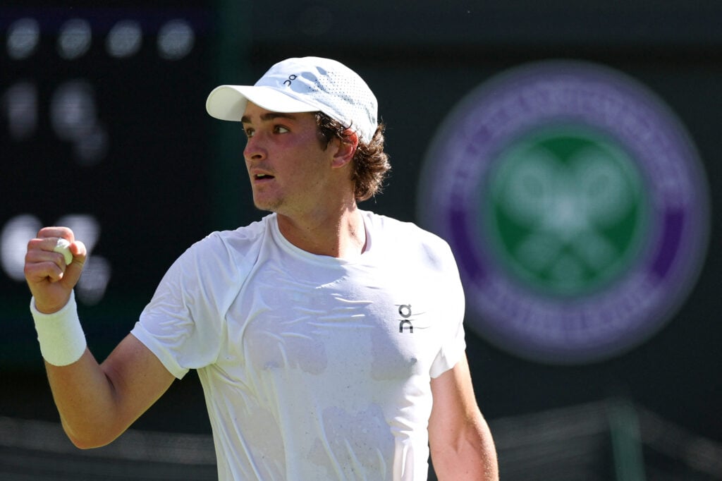 Brazil's Joao Fonseca celebrates after winning against Britain's Jacob Fearnley their men's singles first round tennis match on the first day of the 2025 Wimbledon Championships at The All England Lawn Tennis and Croquet Club in Wimbledon, southwest London, on June 30, 2025.