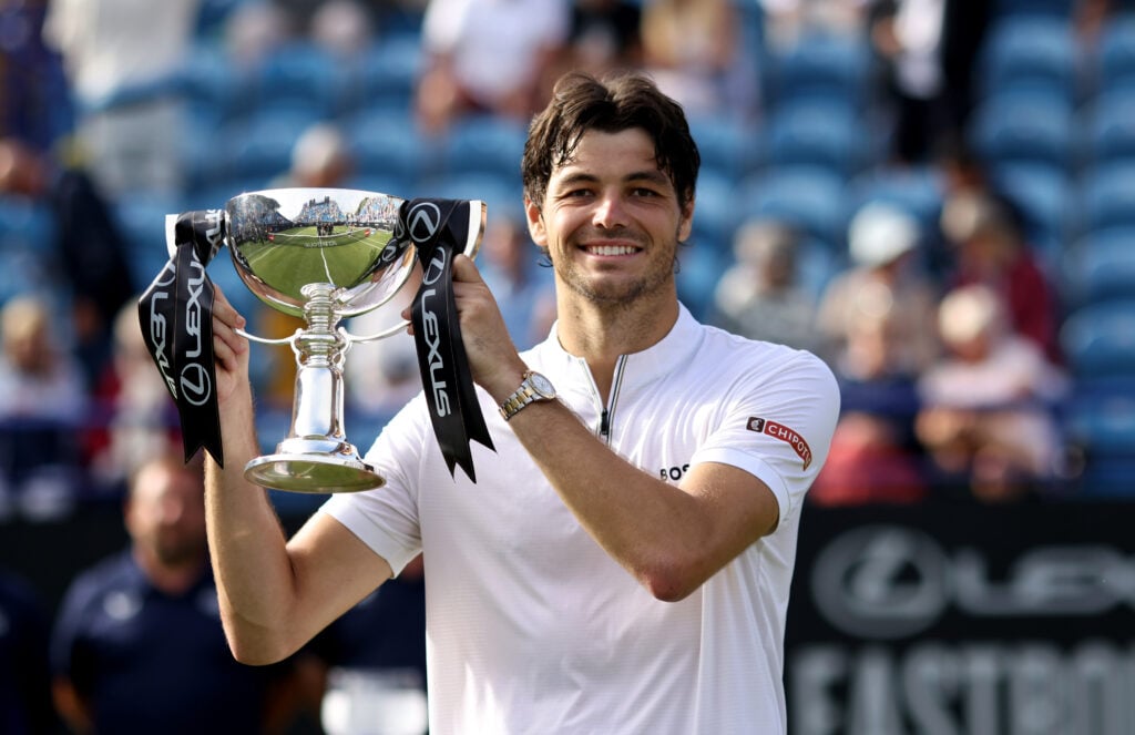 Taylor Fritz of United States poses for a photo with the Lexus Eastbourne Open Men's Singles trophy following victory against Jenson Brooksby of United States in the Men's Singles Final on Day Six of the Lexus Eastbourne Open at Devonshire Park on June 28, 2025 in Eastbourne, England.