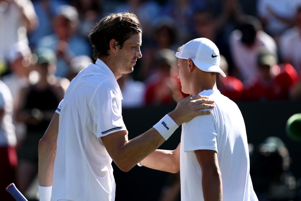 Nicolas Jarry of Chile greets Holger Rune of Denmark following his victory during the Gentlemen's Singles First Round match on day one of The Championships Wimbledon 2025 at All England Lawn Tennis and Croquet Club on June 30, 2025 in London, England.