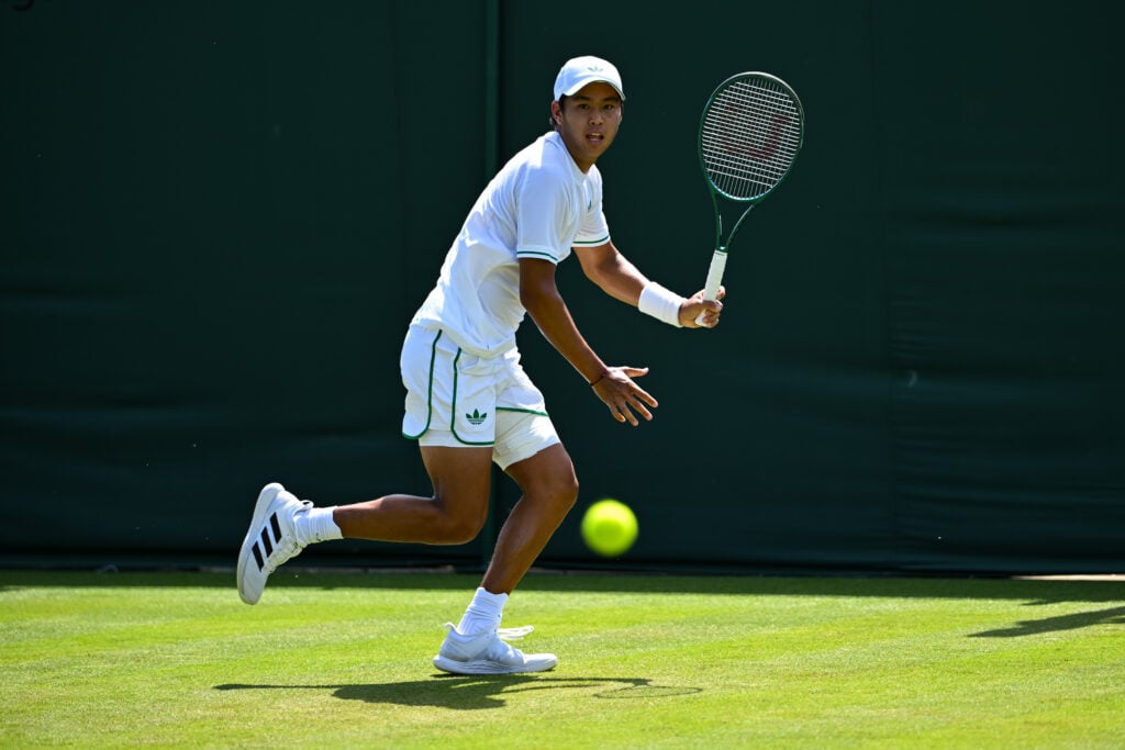 Learner Tien in action during Wimbledon in 2025.