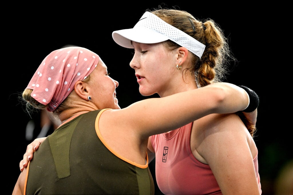 Diana Shnaider and Mirra Andreeva embrace after their semi-final match in Adelaide.