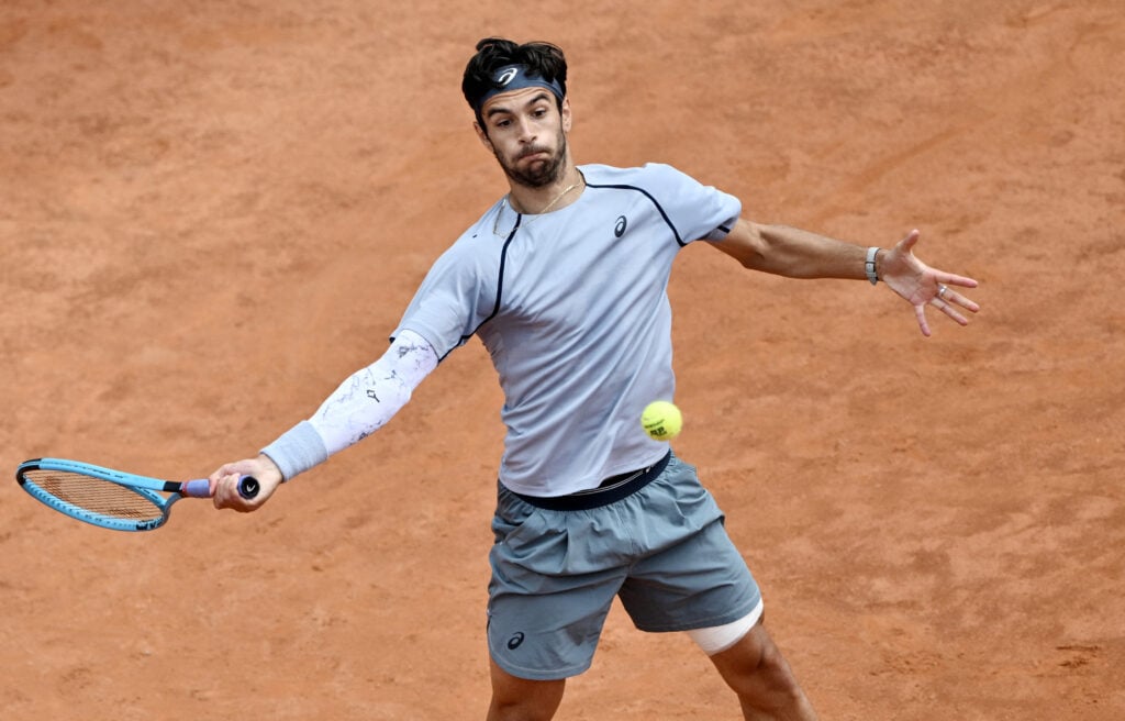 Lorenzo Musetti hits a forehand at the 2026 Italian Open.
