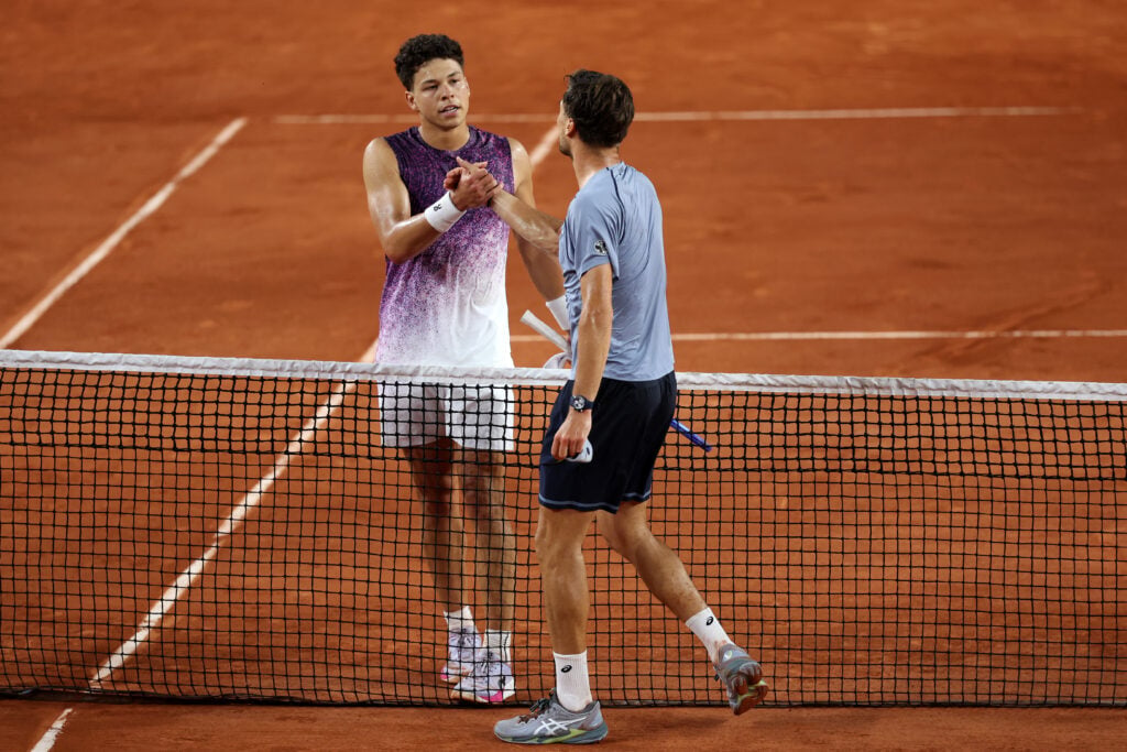 Raphael Collignon of Belgium and Ben Shelton of United States shake hands at the net following their Men's Singles second round match on Day Five of the 2026 French Open at Roland Garros on May 28, 2026 in Paris, France.