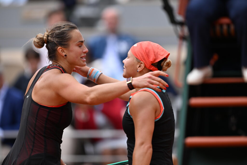 Aryna Sabalenka (L) and Diana Shnaider (R) hug after their women's singles quarter-final match on the eleventh day of the French Open at Philippe-Chatrier Court in Paris, France, on June 3, 2026.