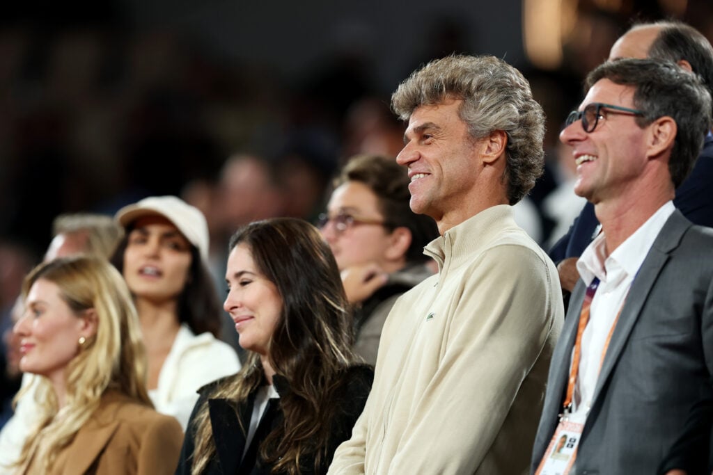 Gustavo Kuerten watches Joao Fonseca play at the 2026 French Open.