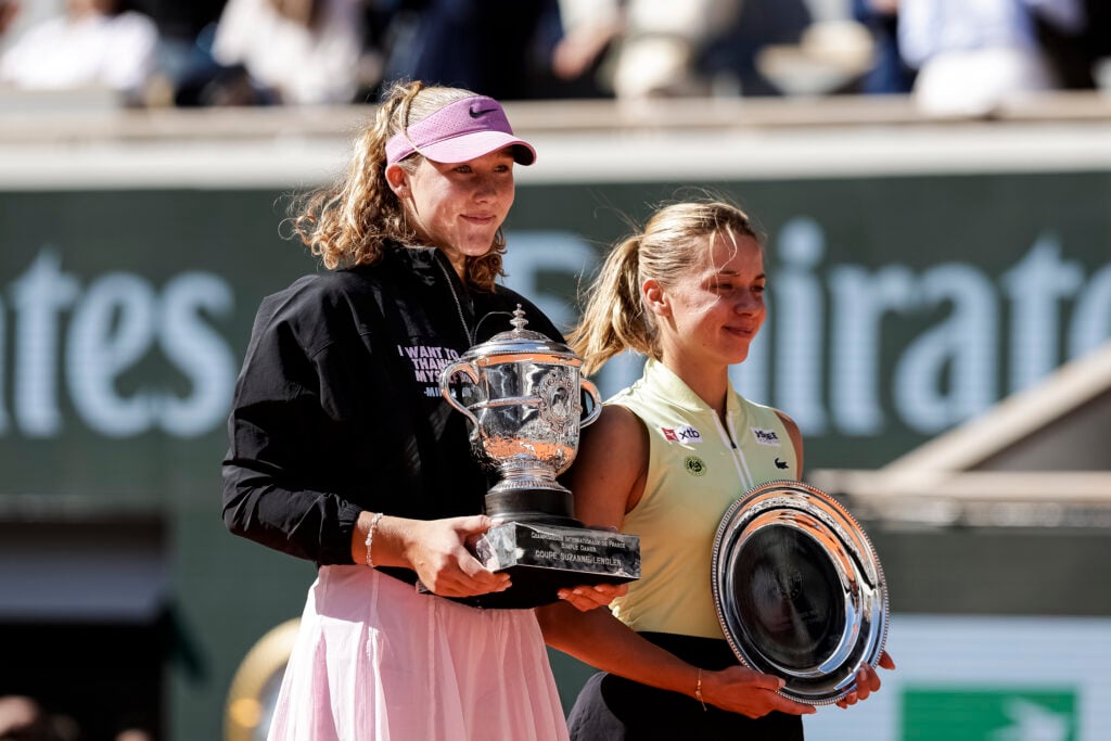 Mirra Andreeva and Maja Chwalinska pictured with their trophies after the 2026 French Open final
