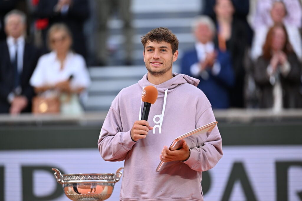 Italy's Flavio Cobolli gives a speech after the final match on day 15 of the French Open tennis tournament on Court Philippe-Chatrier at the Roland-Garros Complex in Paris, France on June 7, 2026.