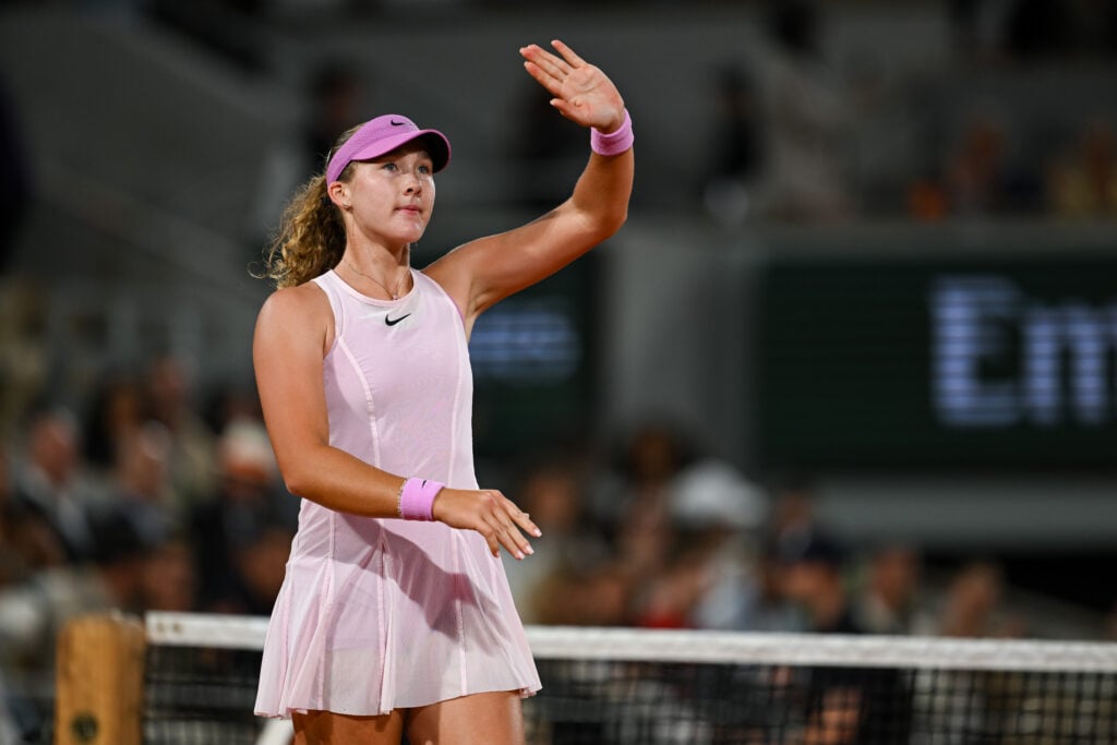 Mirra Andreeva of Russia celebrates winning match point against Marta Kostyuk of Ukraine during the Women's Singles Semifinal on Day Twelve of the 2026 French Open at Roland Garros on June 04, 2026 in Paris, France.
