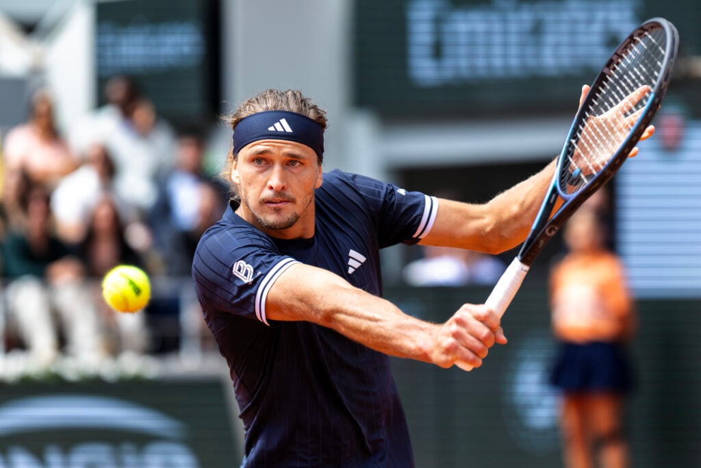 Alexander Zverev returns the ball to Jakub Mensik during their French Open semi-final.