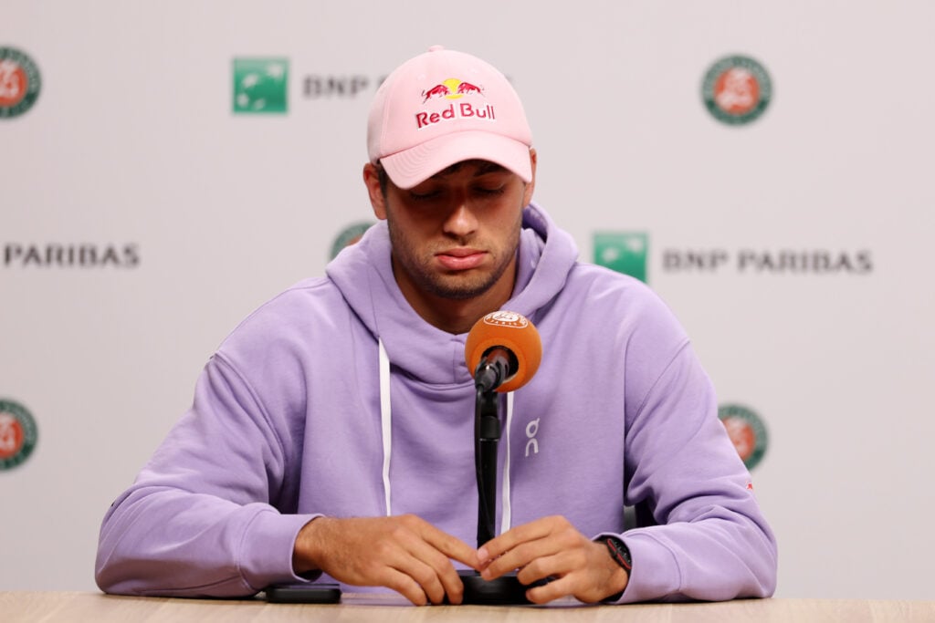 Flavio Cobolli looks downbeat at his press conference