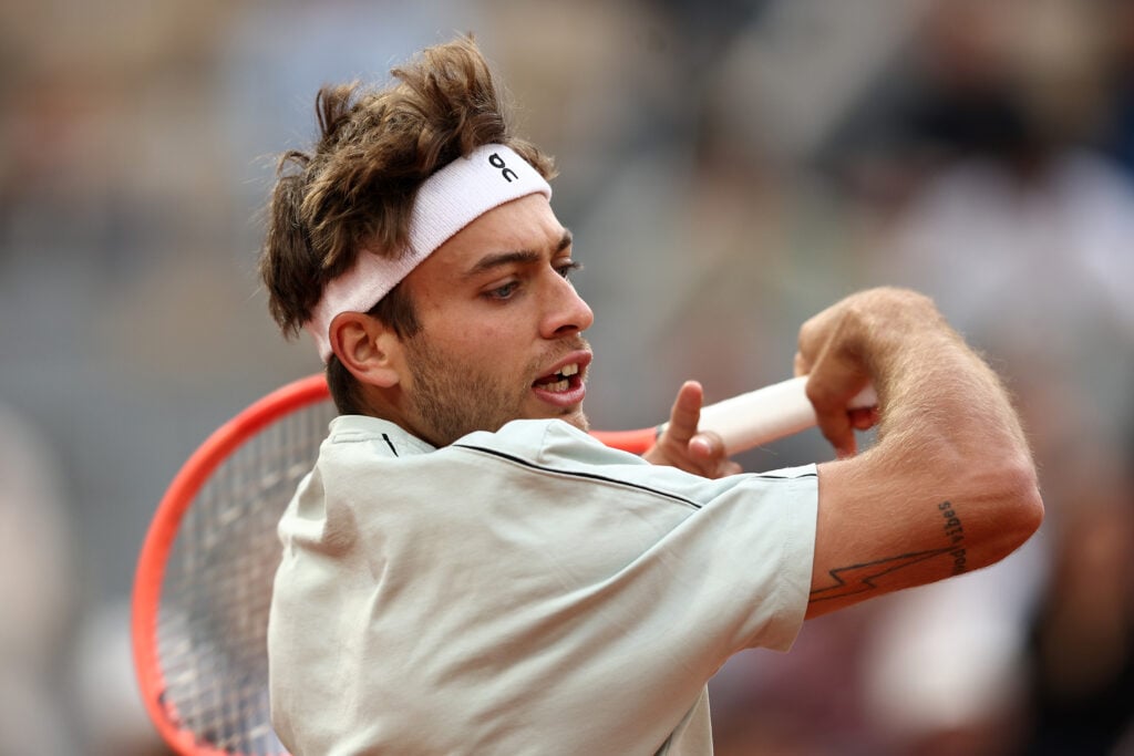 Flavio Cobolli hits a forehand in practice on Court Phillipe-Chatrier on Roland Garros in 2026.