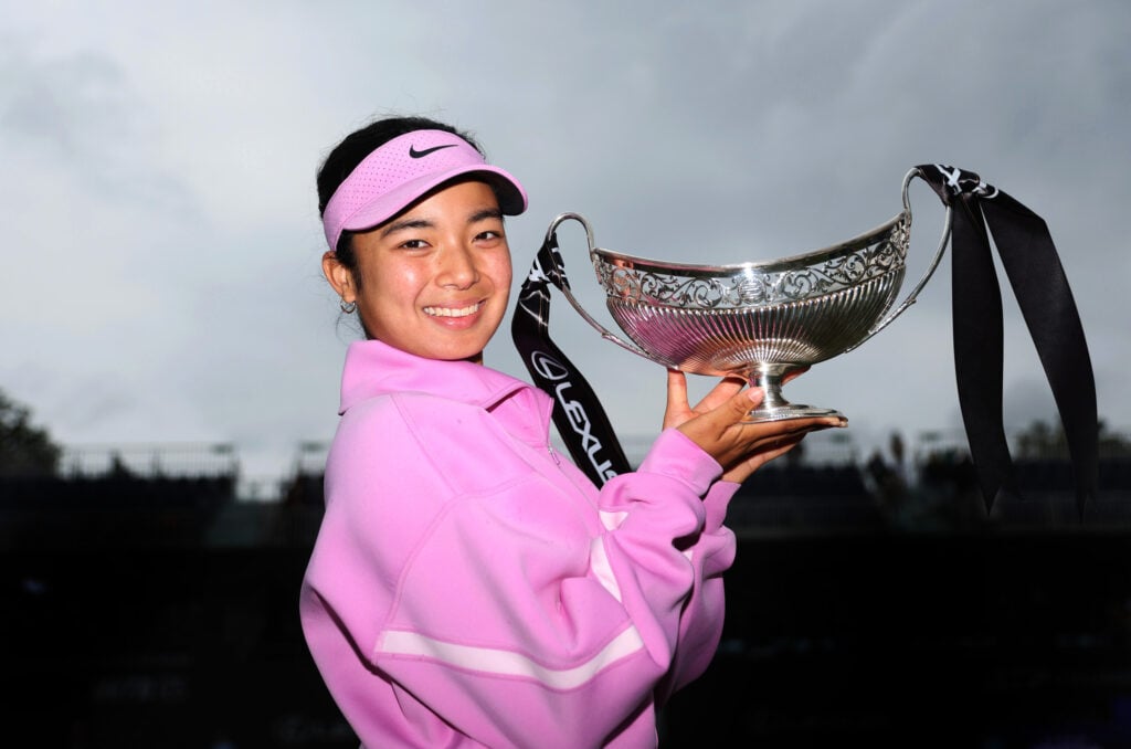 Alex Eala celebrates with the Birmingham Open title.