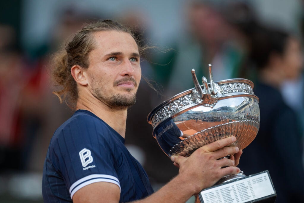 Alexander Zverev of Germany with the winners' trophy after his victory against Flavio Cobolli of Italy in the Men's Singles Final on Court Philippe Chatrier at the 2026 French Open Tennis Tournament at Roland Garros on June 7th, 2026, in Paris, France.
