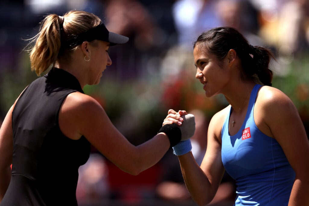 Anna Blinkova and Emma Raducanu of Great Britain interact at the net following the Women's Singles first round match on Day Two of the HSBC Championships at The Queen's Club on June 09, 2026 in London, England.