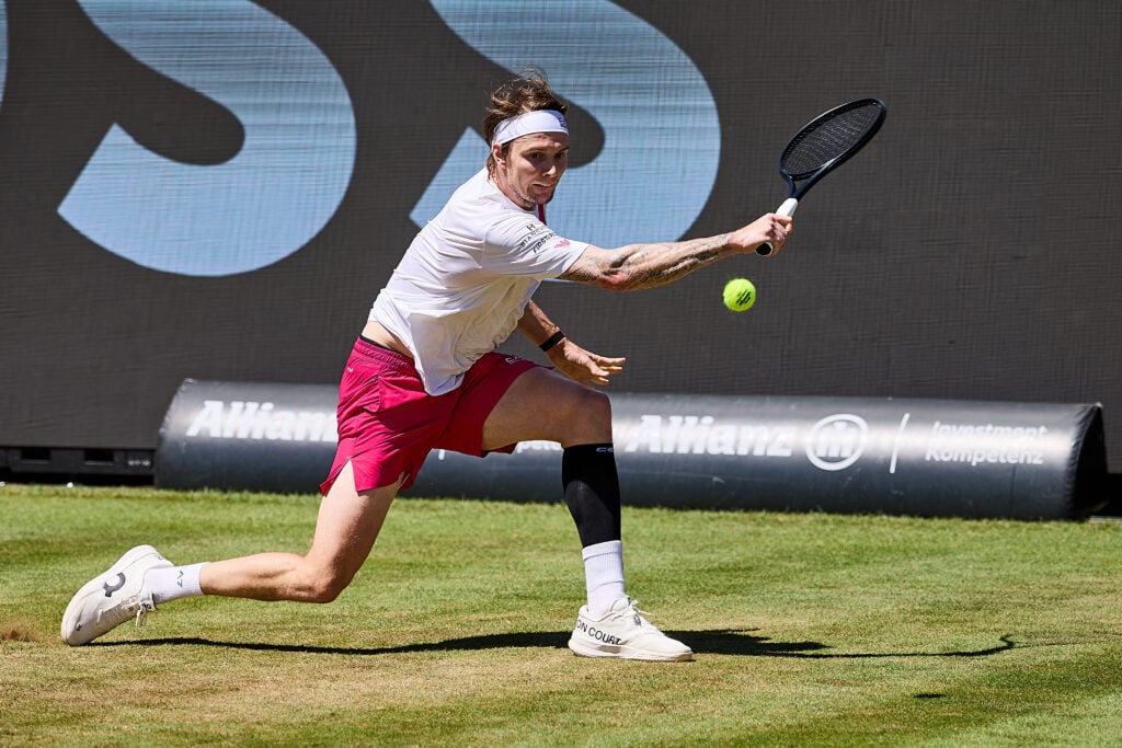 Alexander Bublik of Kazakhstan returns with backhand to Taylor Fritz of the United States during Day 6 of the Boss Open 2026 at Tennisclub Weissenhof on June 13, 2026 in Stuttgart, Germany.