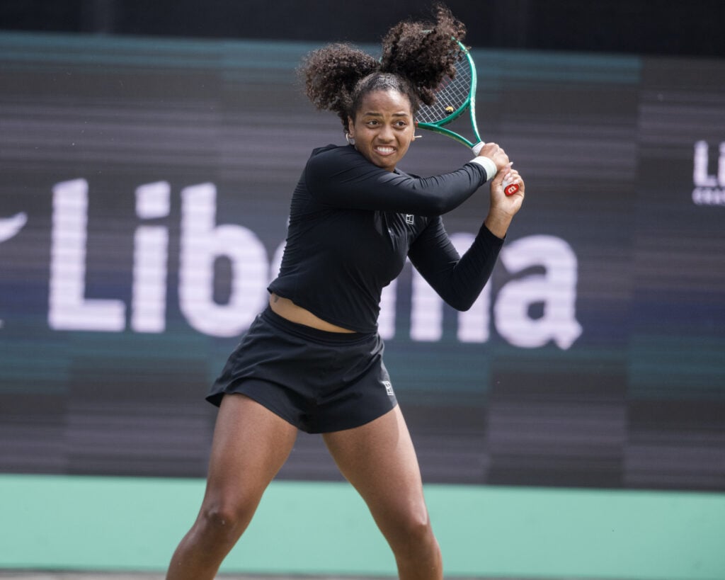 Robin Montgomery of the United States plays a backhand against Ajla Tomljanovic of Australia during their WTA Singles Semifinal match at the Libema Open at Autotron 's-Hertogenbosch in 's-Hertogenbosch, Netherlands, on June 13, 2026.