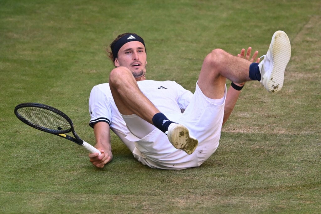 Alexander Zverev lies on the floor during his second-round match at the 2026 Halle Open.