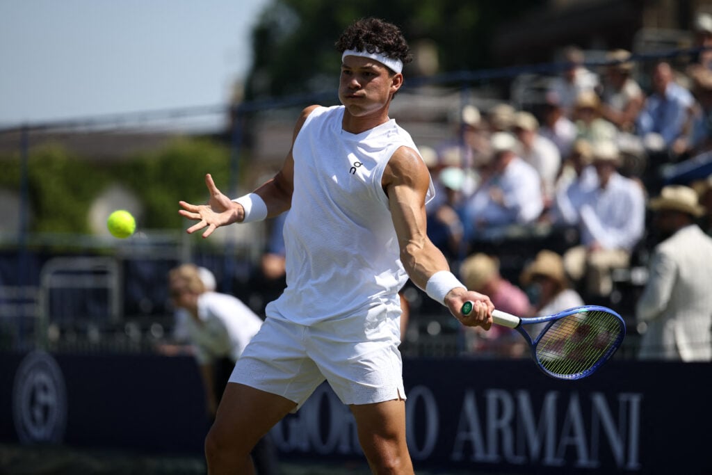 Ben Shelton hits a forehand against Casper Ruud in an exhibition match at the Hurlingham Club iin 2026.