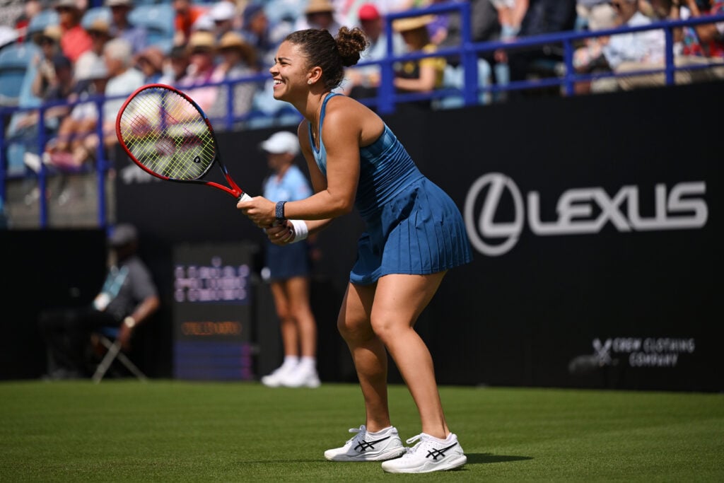 Jasmine Paolini of Italy prepares to return a shot against Tatjana Maria of Germany during the Women's Singles First Round match on Day Two of the Lexus Eastbourne Open at Devonshire Park on June 23, 2026 in Eastbourne, England.
