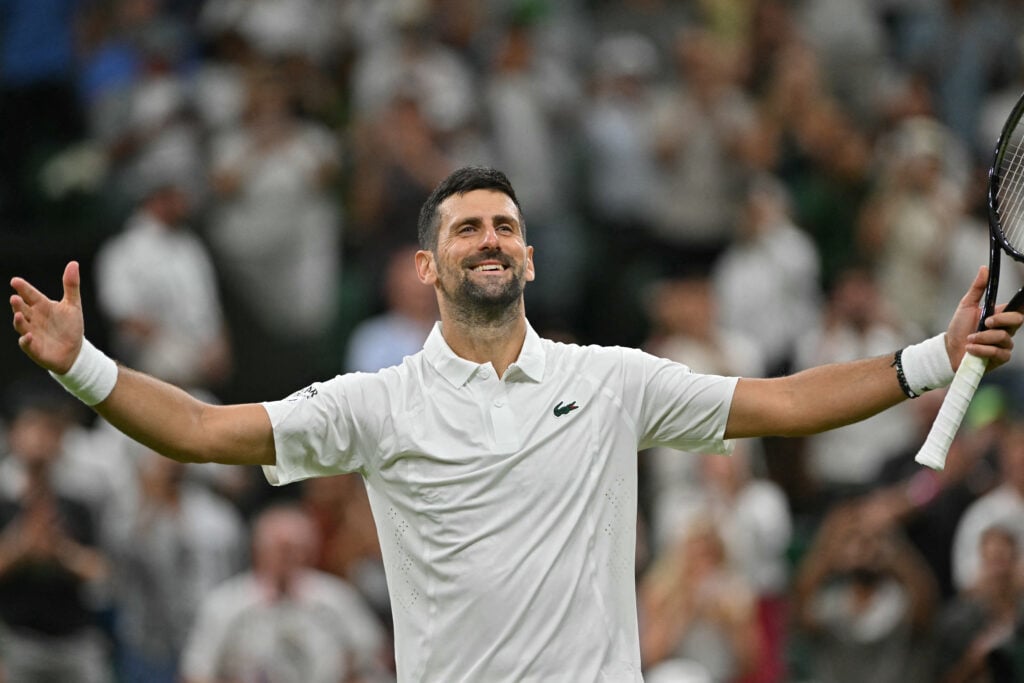 Novak Djokovic reacts after beating Yibing Wu at Wimbledon in 2026.