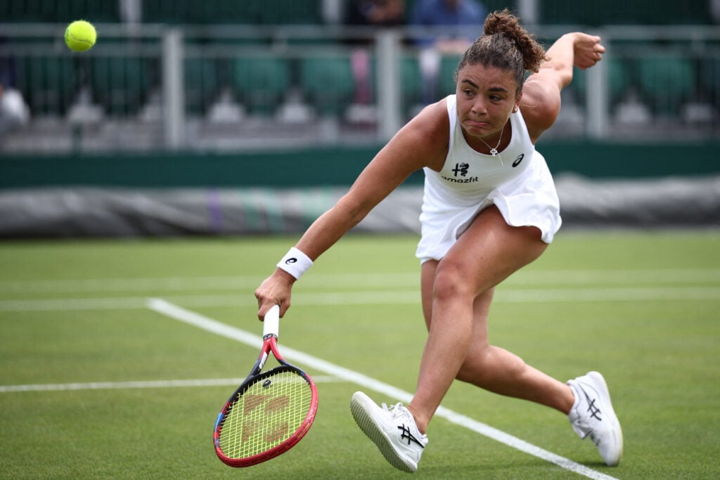 Italy's Jasmine Paolini returns the ball against US player Robin Montgomery during their women's singles first round tennis match on the second day of the 2026 Wimbledon Championships at The All England Lawn Tennis and Croquet Club in Wimbledon, southwest London, on June 30, 2026.