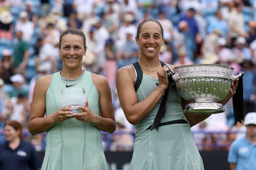 Madison Keys of United States (R) poses for a photo with the Women's Singles Trophy with Runner Up, Tatjana Maria of Germany following the Women's Singles Final on Day Six of the Lexus Eastbourne Open at Devonshire Park on June 27, 2026 in Eastbourne, England.