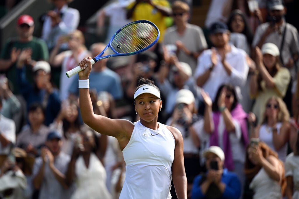 Naomi Osaka reacts after beating Elsa Jacquemot at Wimbledon in 2026.