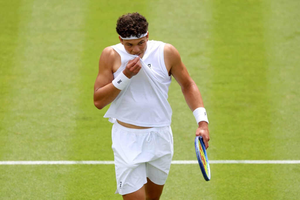 Ben Shelton reacts during his first-round defeat at Wimbledon.