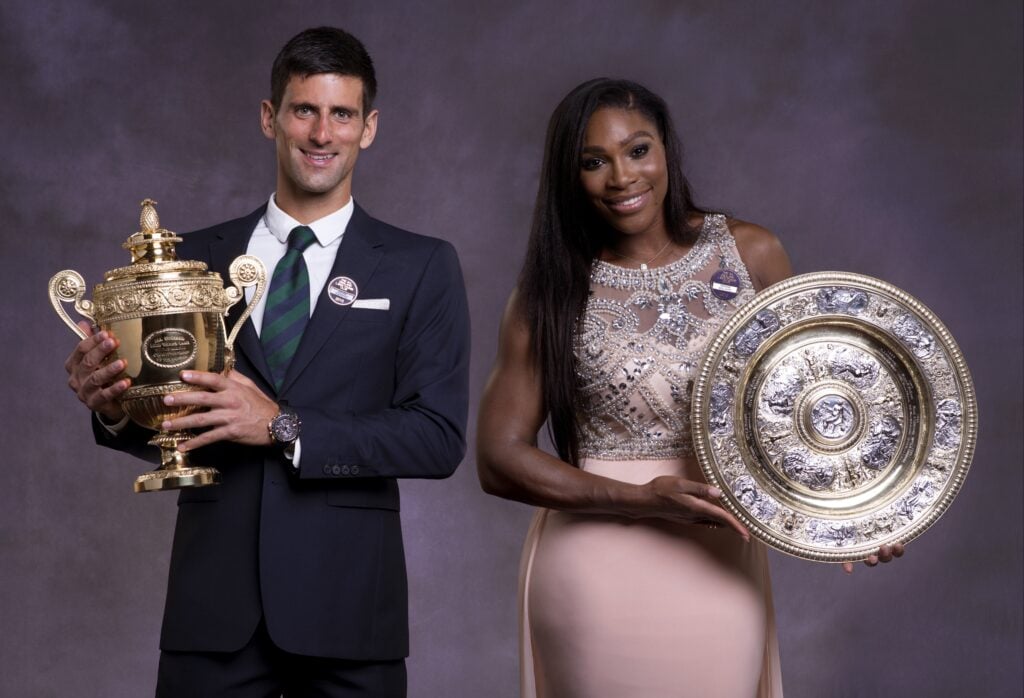 Novak Djokovic and Serena Williams pose with the Wimbledon trophies in 2015.