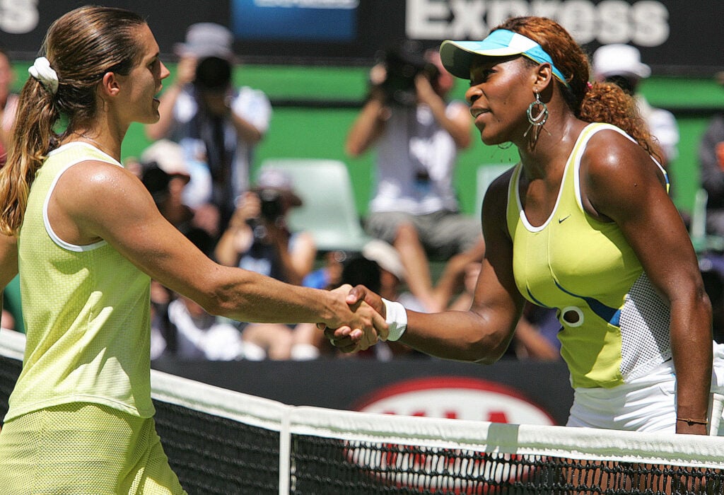 Seventh seed Serena Williams (R) of the US shakes hands with second seed Amelie Mauresmo (L) of France following the American's victory in their women's singles quarter-final match at the 2005 Australian Open tennis tournament in Melbourne, 25 January 2005. Williams won 6-2, 6-2 to advance to the semifinal.