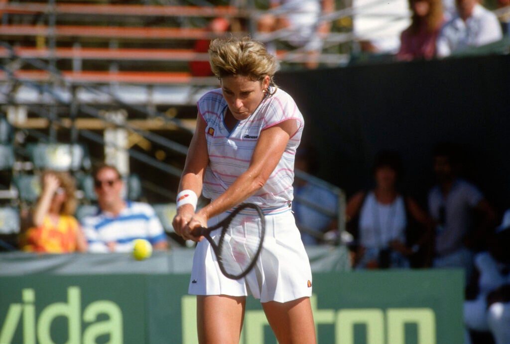 Tennis player Chris Evert of the United States hits a return during the Lipton International Players Championship circa 1985 at the Laver's International Tennis Resort in Delray Beach, Florida.
