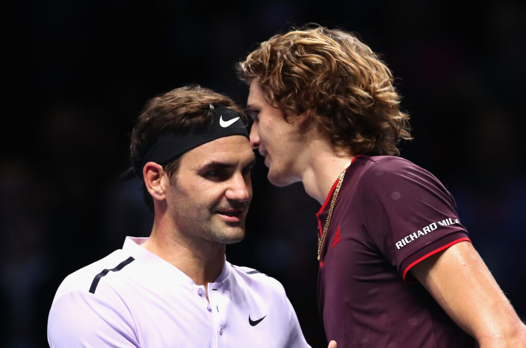 Roger Federer and Alexander Zverev embrace at the 2017 ATP Finals.