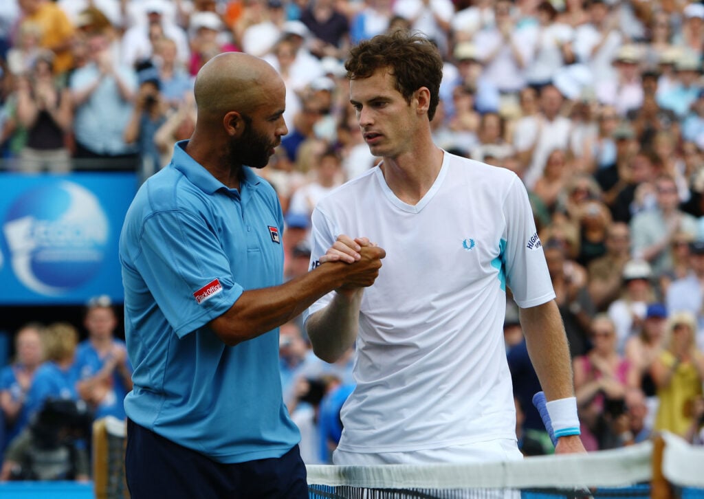 Andy Murray of Great Britain is congratulated by James Blake of USA after winning the men's final match and the Championship on Day 7 of the AEGON Championship at Queens Club on June 14, 2009 in London, England.