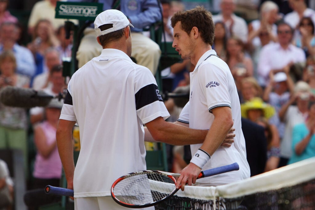 Andy Murray of Great Britain and Andy Roddick of USA shake hands after the men's singles semi final match on Day Eleven of the Wimbledon Lawn Tennis Championships at the All England Lawn Tennis and Croquet Club on July 3, 2009 in London, England.