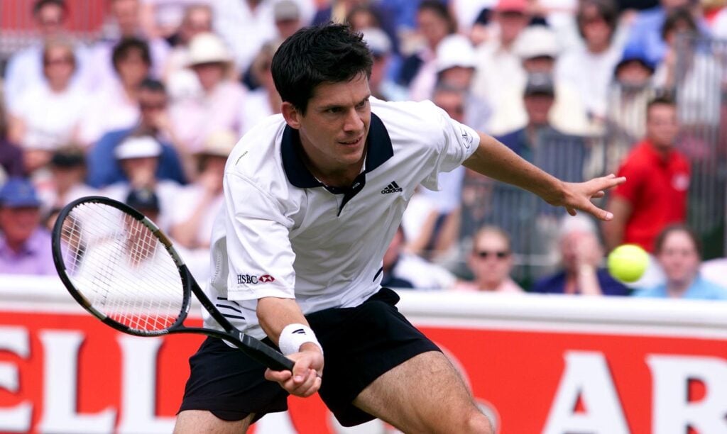 Tim Henman of Great Britain on his way to victory over Cristiano Caratti of Italy during the second round of the Stella Artois Championships at Queen's Club, London.