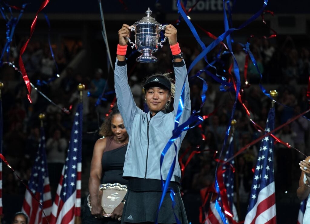 Naomi Osaka of Japan with trophy after winning against Serena Williams of the US during their Women's Singles Finals match at the 2018 US Open