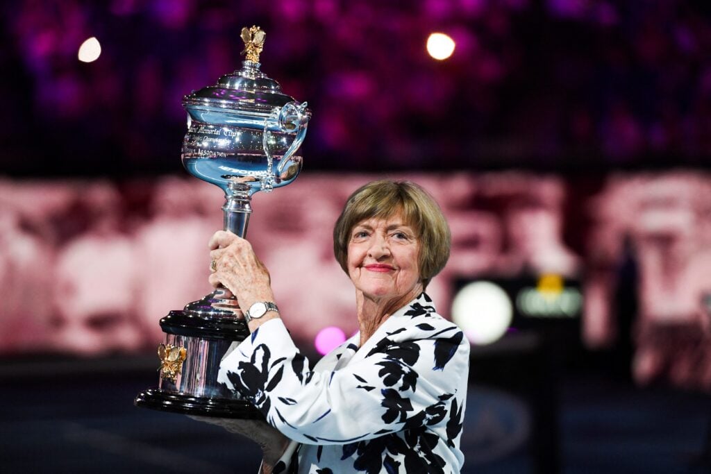 Former Australian tennis player Margaret Court poses with a replica of the trophy to commemorate 50 years of her Australian grand slam win before the start of men's singles match between Spain's Rafael Nadal and Australia's Nick Kyrgios on day eight of the Australian Open tennis tournament in Melbourne on January 27, 2020.