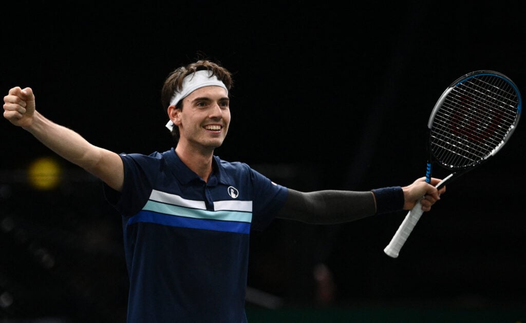 Marc-Andrea Huesler celebrates after beating Jannik Sinner at the 2022 Paris Masters.