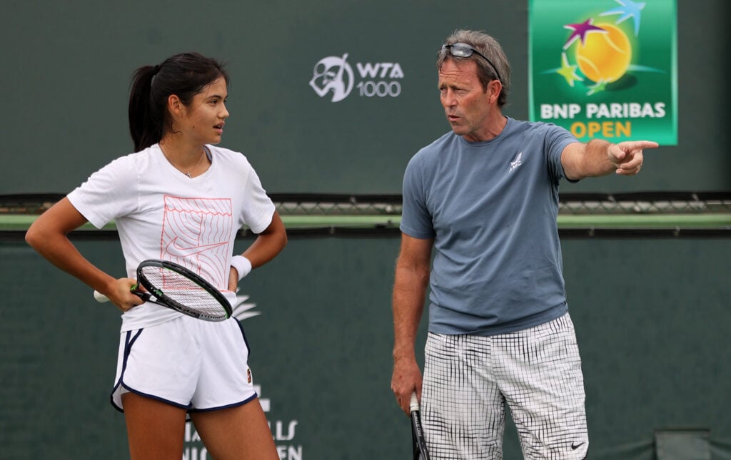 Emma Raducanu receiving coaching advice from Jeremy Bates at Indian Wells in 2021.