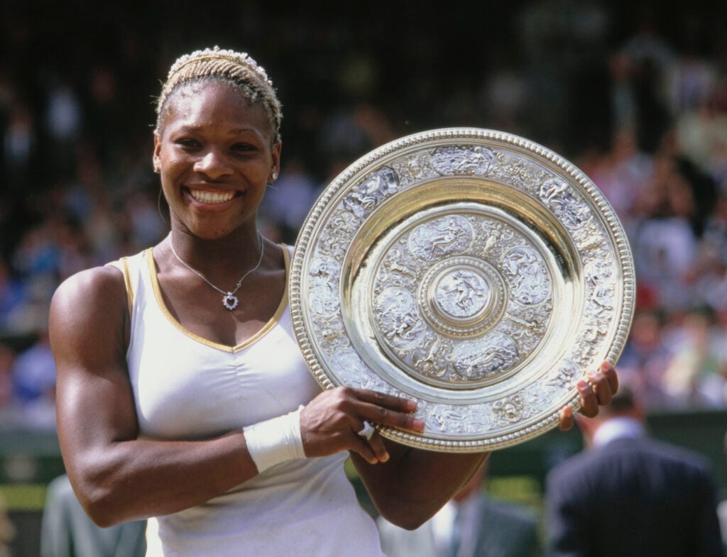 Serena Williams from the United States holds the Venus Rosewater Dish after winning the Women's Singles Final match against her sister Venus Williams at the Wimbledon Lawn Tennis Championship on 6th July 2002 at the All England Lawn Tennis and Croquet Club in Wimbledon, London, England. Serena Williams won the match and championship 7 - 6, 6 - 3.