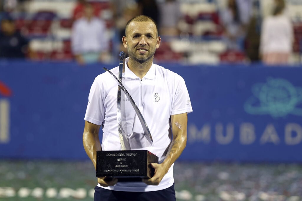 Daniel Evans of Great Britain poses with the trophy after defeating Tallon Griekspoor of the Netherlands during the men's singles final on Day 9 of the Mubadala Citi DC Open at Rock Creek Tennis Center on August 06, 2023 in Washington, DC.