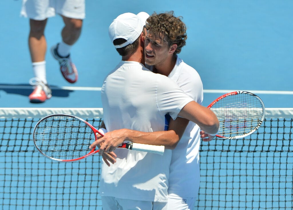 Robin Haase (L) of the Netherlands and Igor Sijsling of the Netherlands celebrates winning their doubles semifinal match against Marcel Granollers of Spain and Marc Lopez of Spain during day eleven of the 2013 Australian Open at Melbourne Park on January 24, 2013 in Melbourne, Australia.
